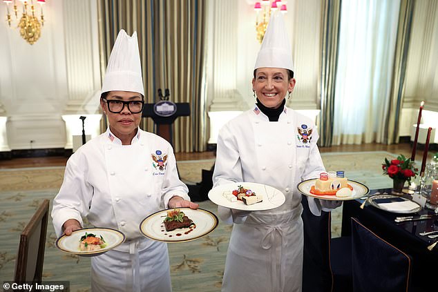 White House Executive Chef Cris Comerford (left) and White House Executive Pastry Chef Susie Morrison (right) show off the plates of food that will be served at the state dinner - 200 Lobsters, American Wine And Cheese: All The Details On Bidens' State Dinner For France